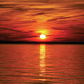 Bright Orange Sun over the waters of the Sound Outer Banks
